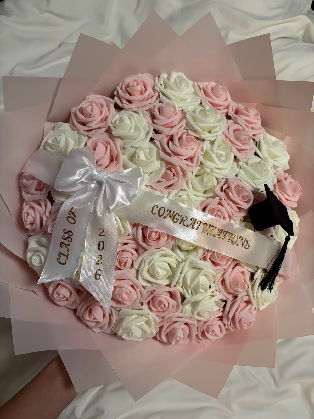 Pink and white graduation rose bouquet