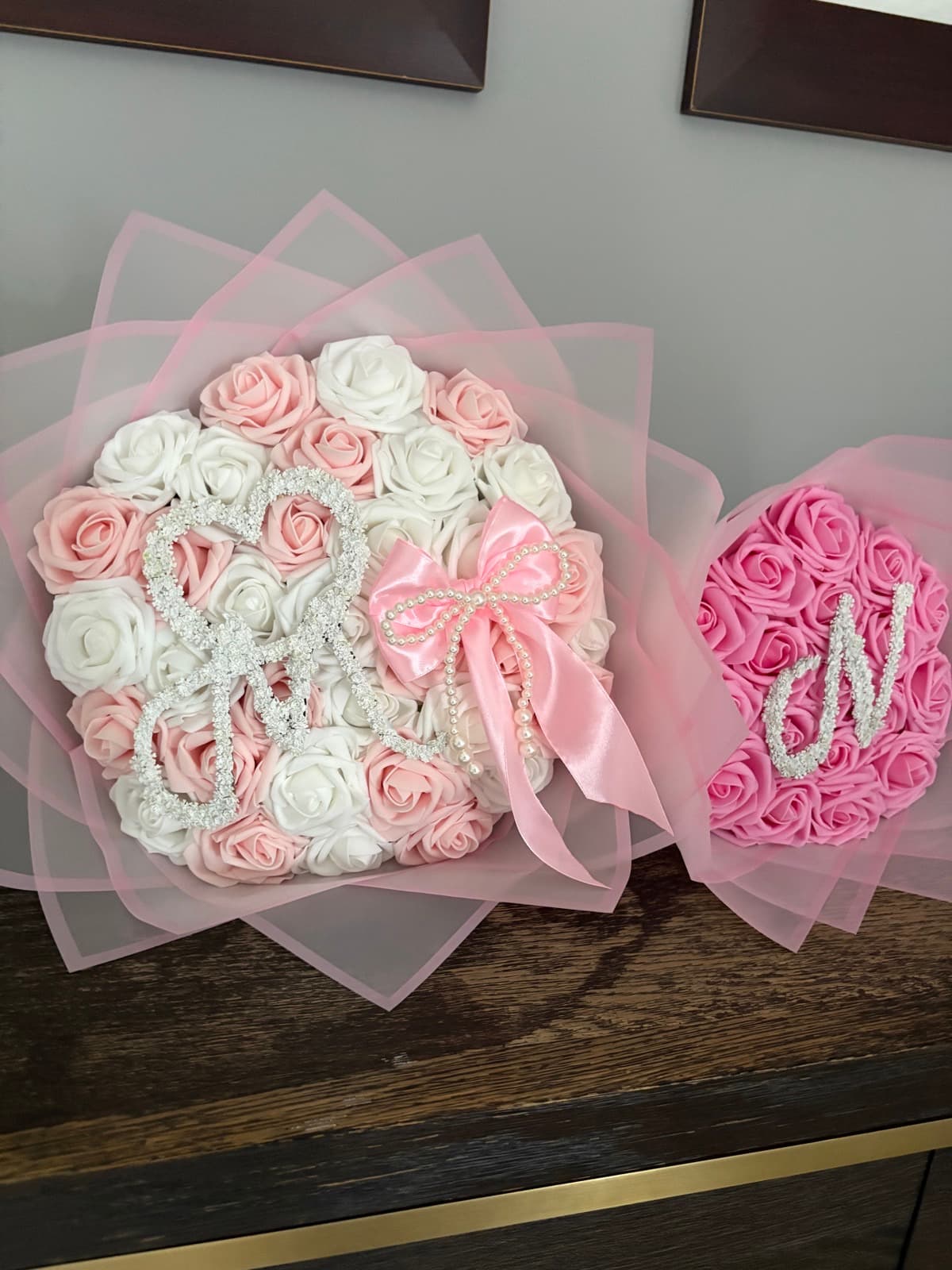 Pink monogram eternal rose bouquets